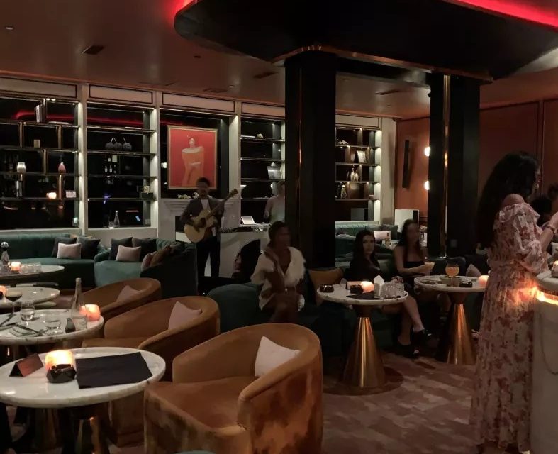 Moody bar and dining interior at Miss Fish restaurant, Canggu