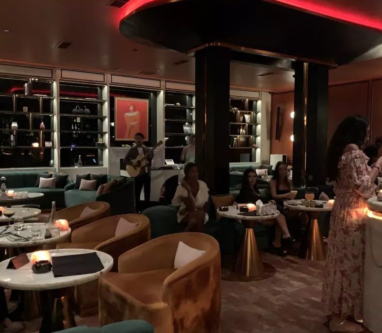 Moody bar and dining interior at Miss Fish restaurant, Canggu