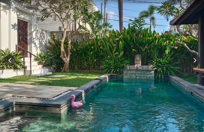 Orchid Villas pool with a Balinese gazebo and tropical garden in Umalas